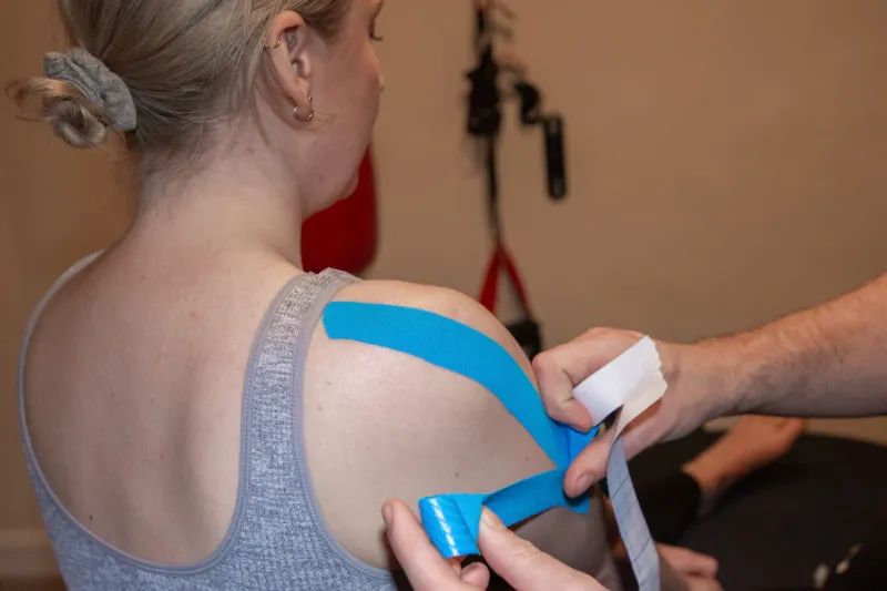 Sports taping on a shoulder